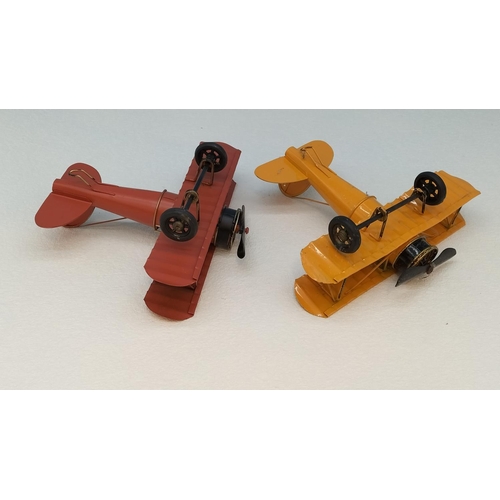465 - Tin War Planes (2). 10cm High, 20cm x 22cm.
