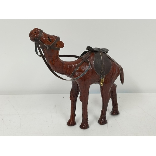 437 - Leather Camel Figures (2). 19cm High x 19cm.