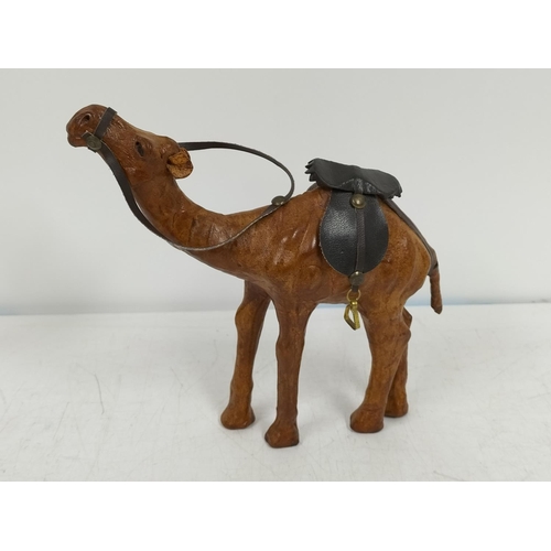 437 - Leather Camel Figures (2). 19cm High x 19cm.