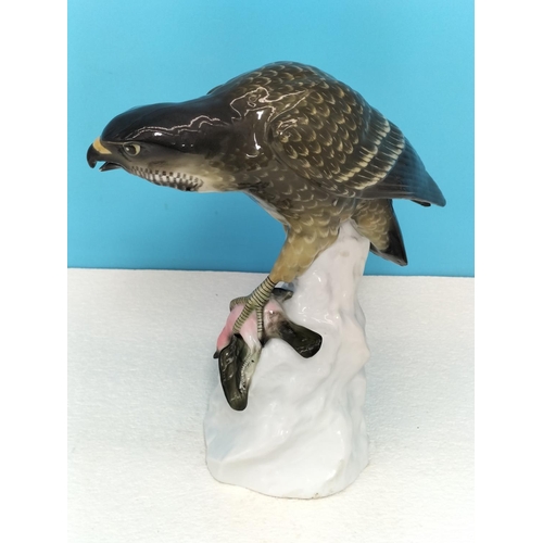102 - Large Continental Porcelain Figure of a Peregrine Falcon. 24cm High, 23cm x 11cm. Restoration to Win... 