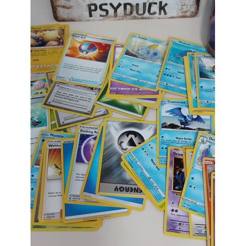 30 - Quantity of Pokemon Trading Cards in Pokemon Tin plus Tin Sign. 30cm x 20cm.