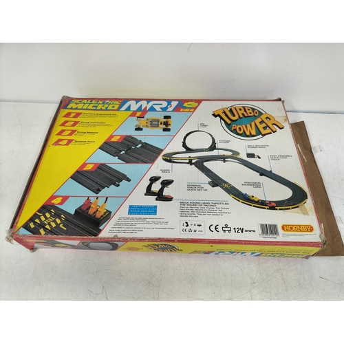 109 - Boxed Scalextric Micro MR1 Race Track and Cars.