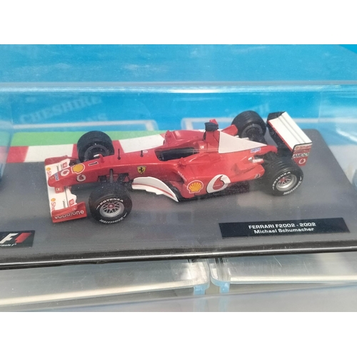 47 - Cased Altaya/Panini F1 Car Collection 1:43 Scale Vehicles (7) to include Michael Schumacher Ferrari ... 