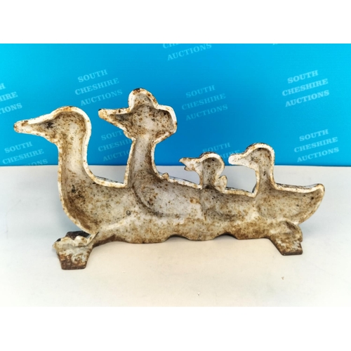 407 - Cast Metal Doorstop of a Duck Family. 18cm High x 30cm.