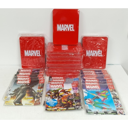 143 - 10 x Marvel Collector Tins plus a Collection of Fact File Magazines.
