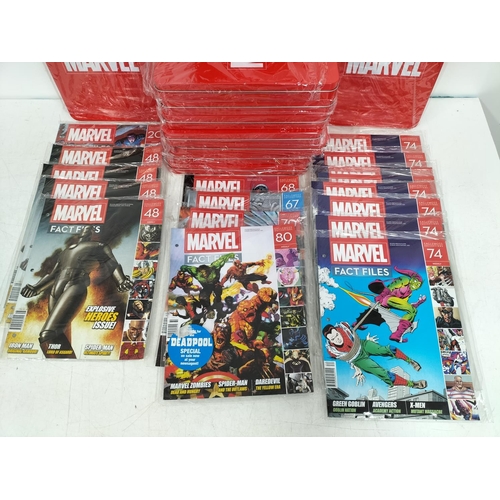 143 - 10 x Marvel Collector Tins plus a Collection of Fact File Magazines.