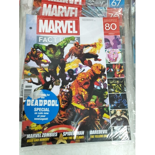 143 - 10 x Marvel Collector Tins plus a Collection of Fact File Magazines.