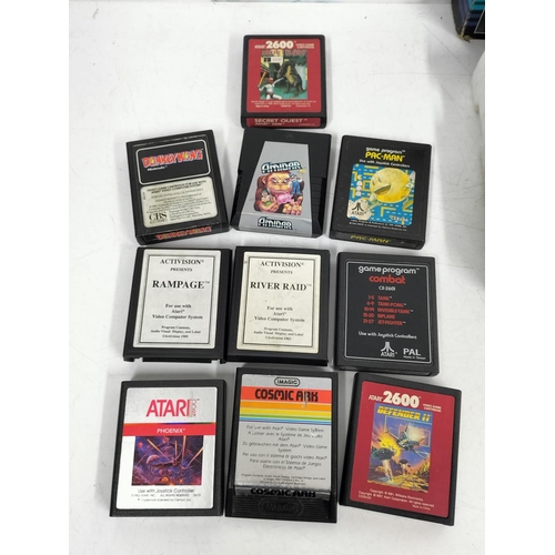 30A - ATARI 2600 Gaming System (Powers Up), Spectravideo Compumate Keyboard and a Wide Variety of Games to... 