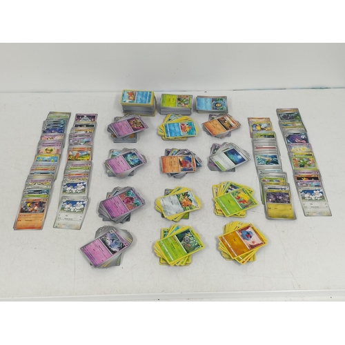262 - Extensive Collection of over 1,000 Pokemon Cards including Holographics, Rares, Reverse Holos from V... 