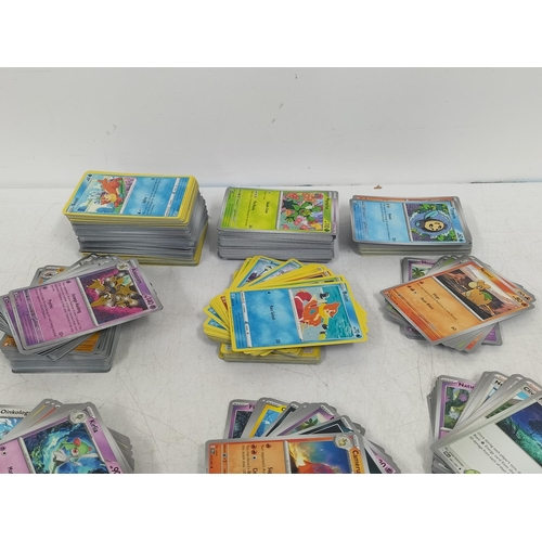262 - Extensive Collection of over 1,000 Pokemon Cards including Holographics, Rares, Reverse Holos from V... 