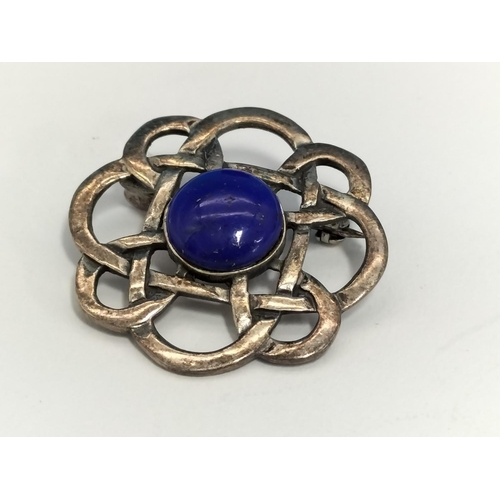 129 - Silver Celtic Brooches with Lapis Lazuli Centres (2).