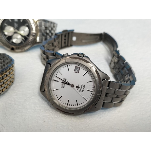 310 - Purple Glass Bowl with a Quantity of Watches for Spares/Repair. Bowl 6cm High, 20cm Diameter.