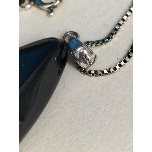 143 - Boxed Robinson's Whitby Jet Pendant on 18