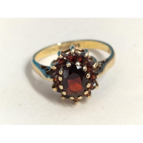 146 - 9ct Gold 375 Garnet Cluster Ring. Size K. Total Weight 2.4 Grams.