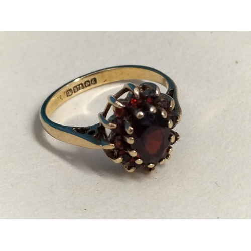 146 - 9ct Gold 375 Garnet Cluster Ring. Size K. Total Weight 2.4 Grams.