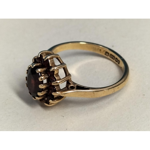 146 - 9ct Gold 375 Garnet Cluster Ring. Size K. Total Weight 2.4 Grams.