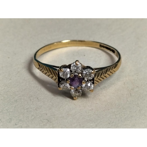 149 - 9ct Gold 375, Amethyst and Cubic Zirconia Stone Ring Size N. Weight 1 Gram.