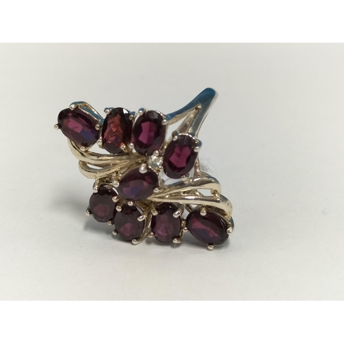 160 - 925 Silver and Ruby Coloured Cubic Zirconia Cluster Ring. Size N. Boxed.