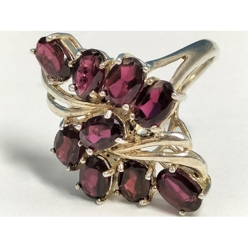 160 - 925 Silver and Ruby Coloured Cubic Zirconia Cluster Ring. Size N. Boxed.
