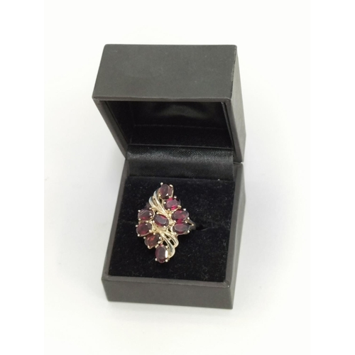 160 - 925 Silver and Ruby Coloured Cubic Zirconia Cluster Ring. Size N. Boxed.