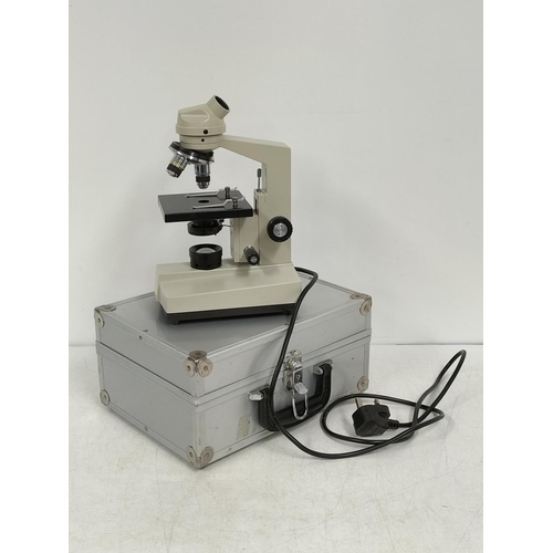 286 - Cased Pyser-SG1 Microscope with 360 Degrees Rotatable Binocular Head. Excellent Condition.