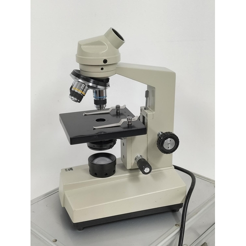 286 - Cased Pyser-SG1 Microscope with 360 Degrees Rotatable Binocular Head. Excellent Condition.