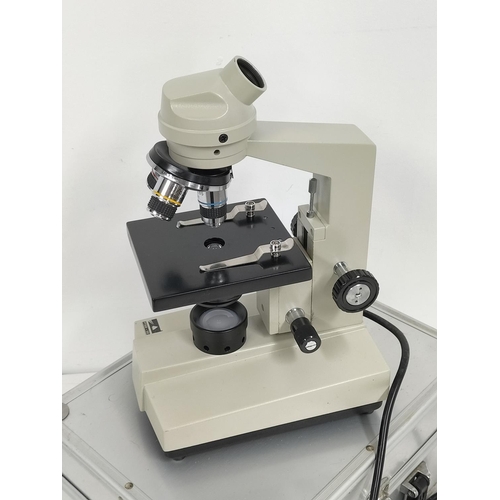 286 - Cased Pyser-SG1 Microscope with 360 Degrees Rotatable Binocular Head. Excellent Condition.