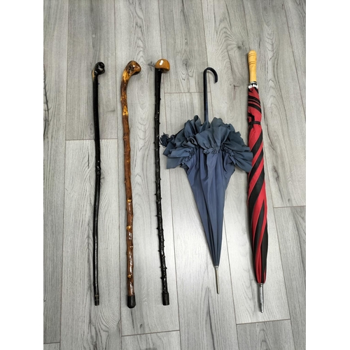 296 - Collection of Walking Sticks (3) to include an Irish Blackthorn Example plus Golf Umbrella and Navy ... 