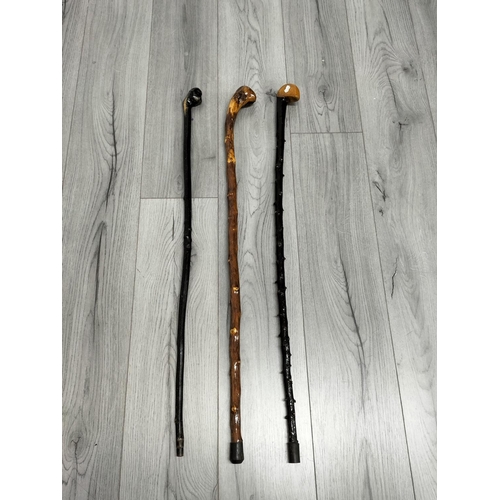 296 - Collection of Walking Sticks (3) to include an Irish Blackthorn Example plus Golf Umbrella and Navy ... 