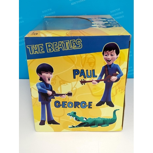 18 - The Beatles Mcfarlane toys The Beatles deluxe box set feature all 4 band members in their 1965 anima... 