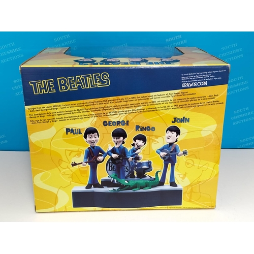 18 - The Beatles Mcfarlane toys The Beatles deluxe box set feature all 4 band members in their 1965 anima... 
