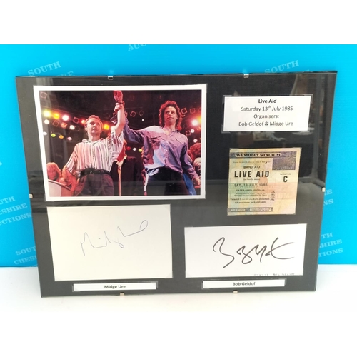 30 - Live Aid Framed display relating to the Live Aid Concert 13th July 1985 includes photo of Bob Geldof... 