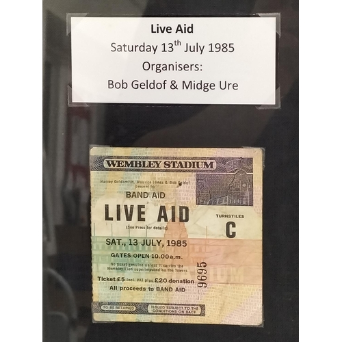 30 - Live Aid Framed display relating to the Live Aid Concert 13th July 1985 includes photo of Bob Geldof... 