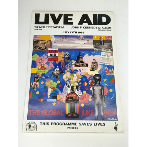 30 - Live Aid Framed display relating to the Live Aid Concert 13th July 1985 includes photo of Bob Geldof... 