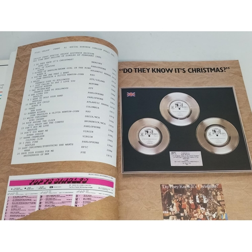 30 - Live Aid Framed display relating to the Live Aid Concert 13th July 1985 includes photo of Bob Geldof... 
