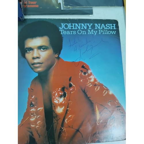 45 - Collection of music memorabilia to include signed examples, Eric Clapton tour program, Q magazine si... 