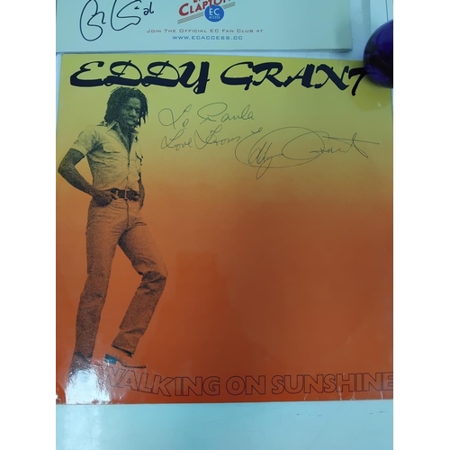 45 - Collection of music memorabilia to include signed examples, Eric Clapton tour program, Q magazine si... 