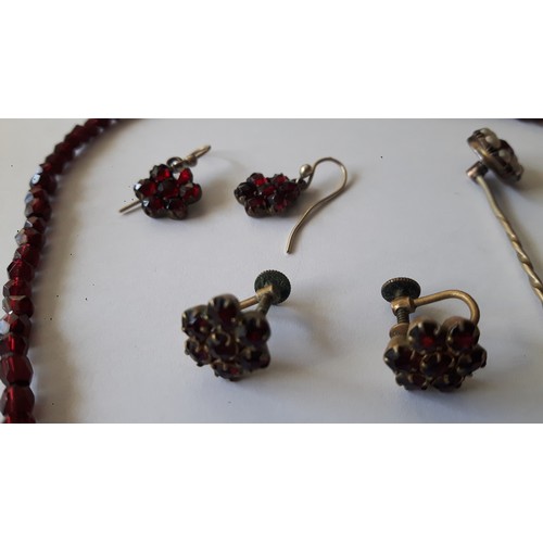 349 - Antique Garnet set including 2 pairs of earrings, brooch & bead necklace, and a Ruby and seeded pear... 