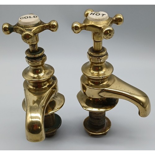 5 - ARCHITECTURAL - PAIR VICTORIAN BRASS TAPS. PORCELAIN HOT AND COLD 16CM TALL