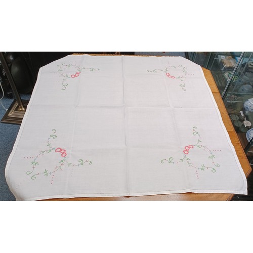 53 - Textiles - hand embroided linen floral table cloths, 33