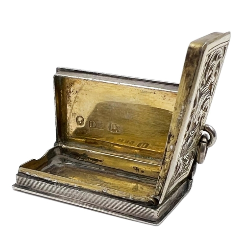 108 - A SILVER VINAIGRETTE OF BOOK FORM WITH ENGINE TURNED DECORATION, BIRMINGHAM,DAVID PETTIFER,1848-1864... 