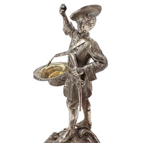 130 - A STUNNING PAIR OF SOILD SILVER FIGURES DEPICTIONG A GENTLEMAN AND A LADY CARRYING BASKETSA stunning... 