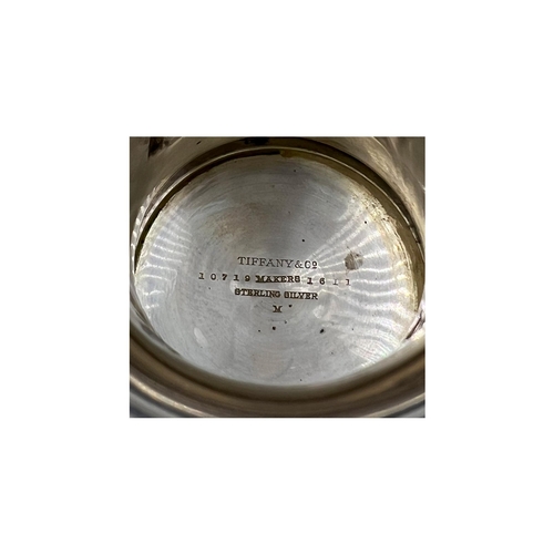 131 - A FINE PAIR OF TIFFANY AND CO. SILVER TAZZA WITH EMBOSSED DECORATION, CIRCA 1900A good quality pair ... 