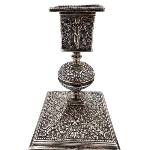 136 - AN UNUSUAL PAIR OF SILVER ENGLISH HALLMARKED CANDLESTICKS DECORATED IN THE INDIAN STYLE, LONODN,1889... 