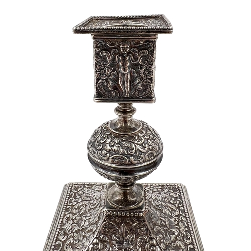 136 - AN UNUSUAL PAIR OF SILVER ENGLISH HALLMARKED CANDLESTICKS DECORATED IN THE INDIAN STYLE, LONODN,1889... 