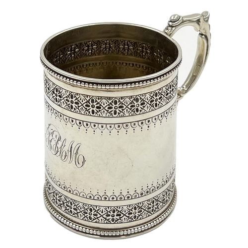 160 - A SMALL VICTORIAN SILVER CHRISTENING TANKARD WITH DECORATION TO UPPER RIM AND BASE, LONDON, 1883A sm... 