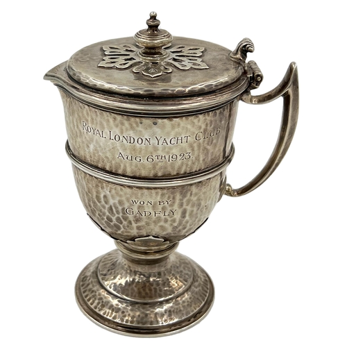 161 - A SMALL VICTORIAN HAMMERED SILVER LIDDED FLAGON WITH A YACHTING INTEREST ENGRAVINGA small Victorian ... 