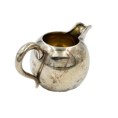 163 - A SMALL RUSSIAN SILVER MILK/CREAM JUG, 1887 (CYRILLIC JO)A small Russian silver milk/cream jug. H: 7... 