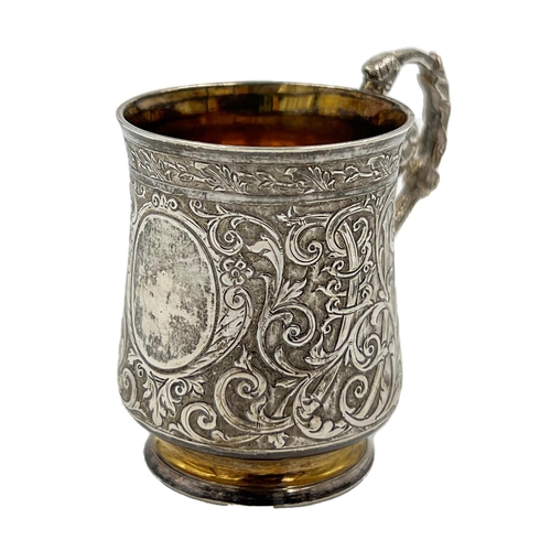 164 - A MINIATURE SILVER TANKARD WITH EXTENSIVE EMBOSSED DECORATION, FRENCH, EARLY 20TH CENTURYA miniature... 