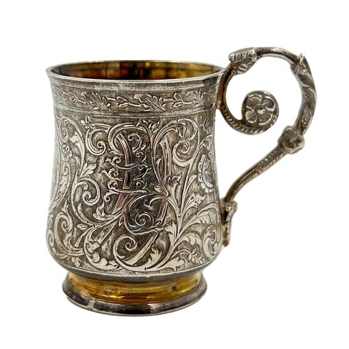 164 - A MINIATURE SILVER TANKARD WITH EXTENSIVE EMBOSSED DECORATION, FRENCH, EARLY 20TH CENTURYA miniature... 